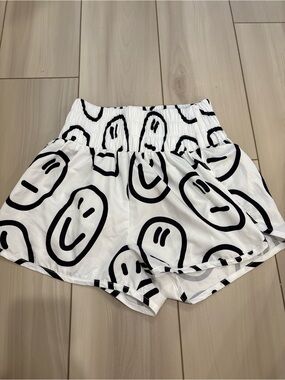 Main Strip White Athletic Shorts with Black Smiley Print